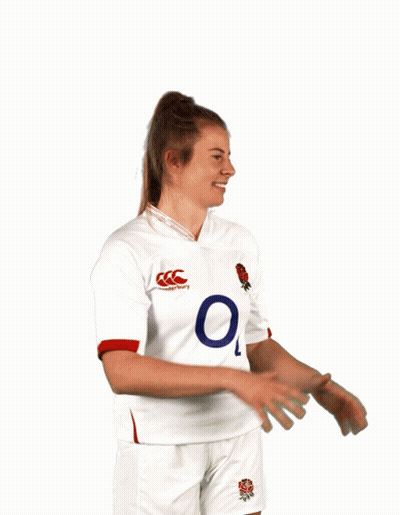 A Man Wearing A White O2 Jersey Holds A Rugby Ball In Front Of His Face GIF