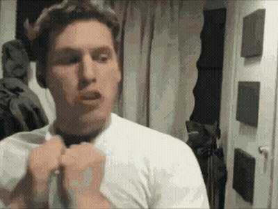 A Man Wearing A White Shirt And A Black Tie GIF
