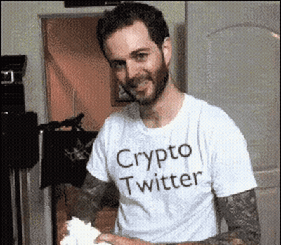 A Man Wearing A White Shirt That Says Crypto Twitter On It GIF