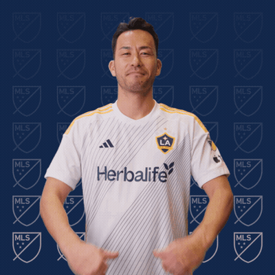 A Man Wearing A White Shirt That Says Herbalife GIF