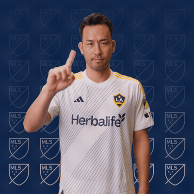 A Man Wearing A White Shirt That Says Herbalife GIF