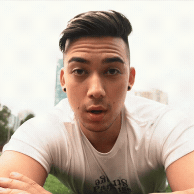 A Man Wearing A White Shirt That Says Paradise GIF