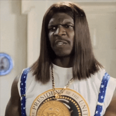 A Man Wearing A White Shirt That Says President Of The United States GIF