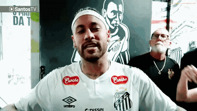 A Man Wearing A White Shirt That Says Umbro On The Front GIF
