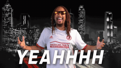 A Man Wearing A White Shirt That Says Yeahhhh GIF