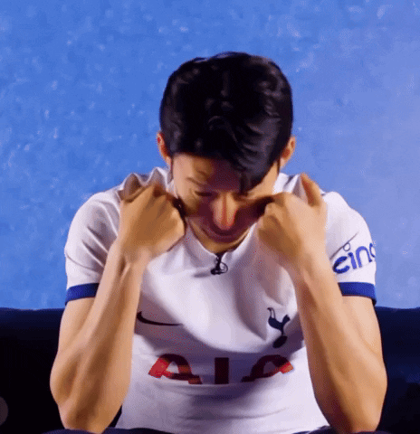 A Man Wearing A White Shirt With Aia On The Sleeve GIF
