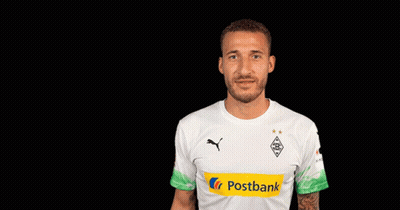 A Man Wearing A White Shirt With Postbank On The Front GIF