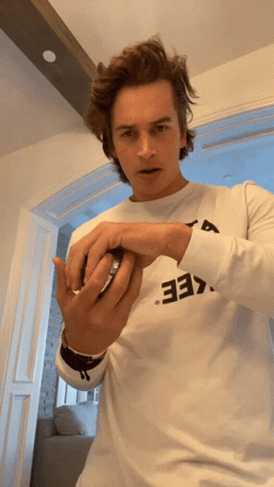 A Man Wearing A White Shirt With The Number 33 On The Front GIF