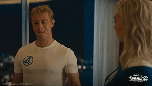 A Man Wearing A White Shirt With The Number 4 On It Stands Next To A Woman GIF