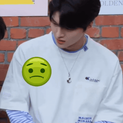 A Man Wearing A White Shirt With The Word Maison On The Front GIF