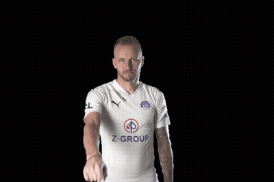 A Man Wearing A White Shirt With Z-Group On The Front GIF