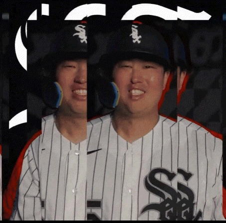 A Man Wearing A White Sox Jersey And A Black Hat GIF