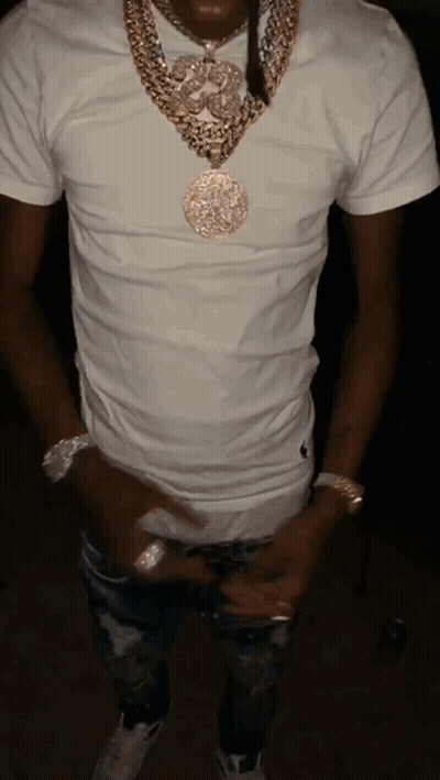 A Man Wearing A White T-Shirt And A Gold Necklace GIF