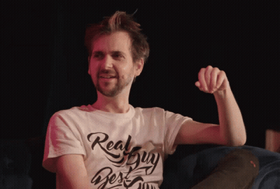 A Man Wearing A White T-Shirt That Says Real Guy On It GIF
