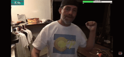 A Man Wearing A White T-Shirt With A Picture Of A Circle On It GIF