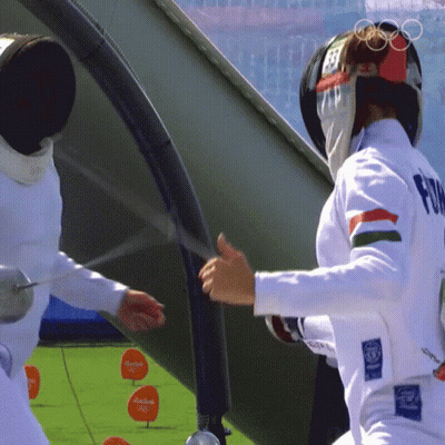 A Man Wearing A White Uniform With The Word Fia On It GIF