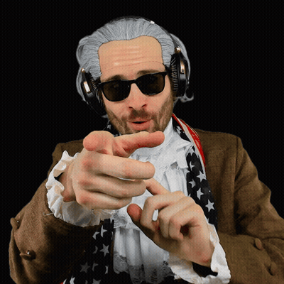A Man Wearing A Wig And Headphones Points At The Camera GIF