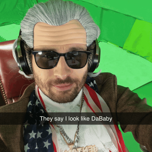A Man Wearing A Wig And Sunglasses Has A Caption That Says " They Say I Look Like Dababy " GIF