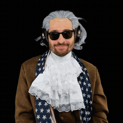 A Man Wearing A Wig And Sunglasses Has Headphones On GIF