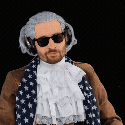 A Man Wearing A Wig And Sunglasses Has Headphones On His Ears GIF