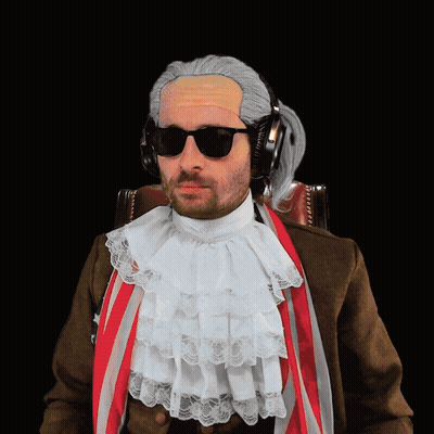 A Man Wearing A Wig And Sunglasses Has Headphones On His Ears GIF