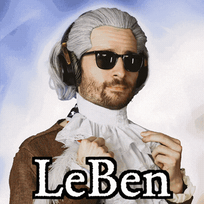 A Man Wearing A Wig And Sunglasses Has The Word Leben On His Shirt GIF
