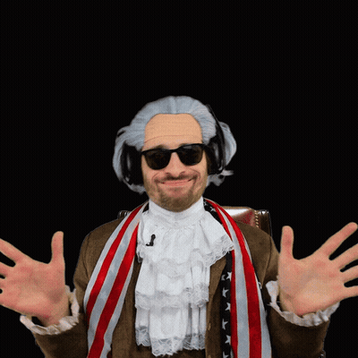A Man Wearing A Wig And Sunglasses Holds His Hands Out GIF