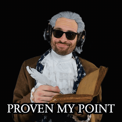 A Man Wearing A Wig And Sunglasses Is Holding A Book And A Feather In His Hand With The Words Proven My Point Below Him GIF