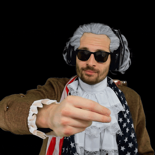 A Man Wearing A Wig And Sunglasses Is Pointing GIF