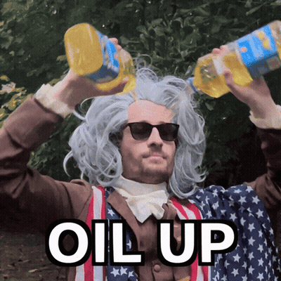 A Man Wearing A Wig And Sunglasses Is Pouring Oil Over His Head With The Words " Oil Up " Below Him GIF