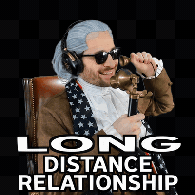 A Man Wearing A Wig And Sunglasses Is Talking On A Telephone With The Words Long Distance Relationship Above Him GIF