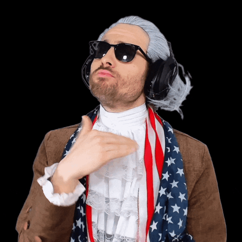 Man Wearing Wig And Sunglasses With American Flag Scarf GIF