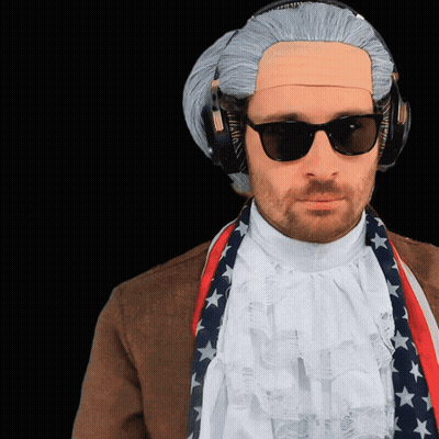A Man Wearing A Wig And Sunglasses With Headphones On His Head GIF