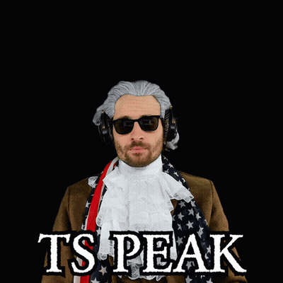 A Man Wearing A Wig And Sunglasses With The Words Ts Peak Above His Head GIF
