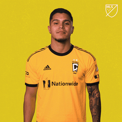 A Man Wearing A Yellow Adidas Shirt With Nationwide On It GIF
