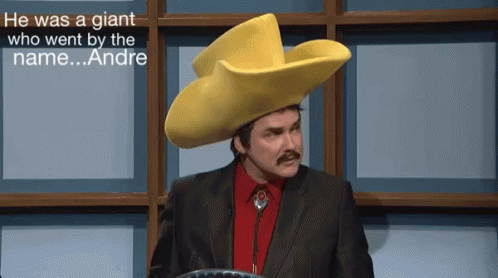 A Man Wearing A Yellow Cowboy Hat With The Words " He Was A Giant Who Went By The Name Andre " Behind Him GIF