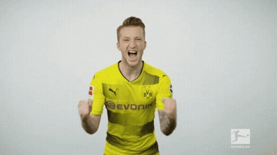 A Man Wearing A Yellow Evonik Shirt Is Screaming GIF