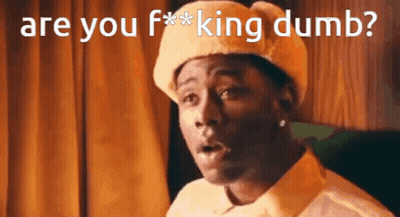 A Man Wearing A Yellow Hat Is Asking If He Is Dumb GIF