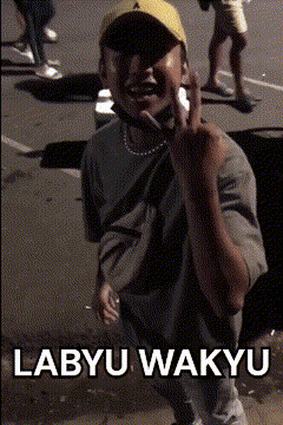 A Man Wearing A Yellow Hat Is Giving The Middle Finger With The Words Labyu Wakyu Below Him GIF