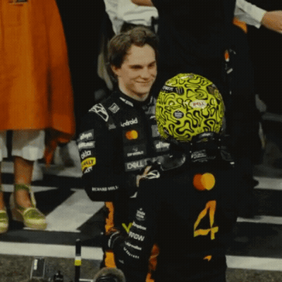 A Man Wearing A Yellow Helmet With The Number 4 On It GIF