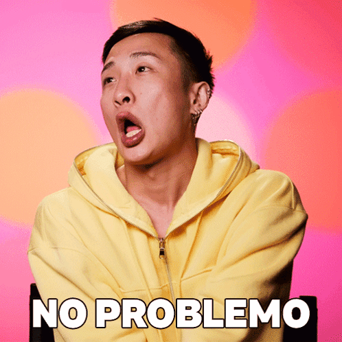 A Man Wearing A Yellow Hoodie Has His Mouth Open And The Words No Problemo Written On The Bottom GIF
