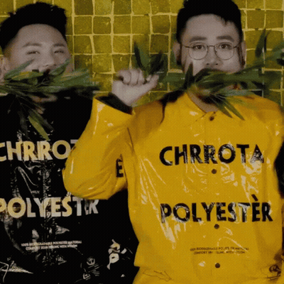A Man Wearing A Yellow Jacket That Says Chrrot Polyester GIF