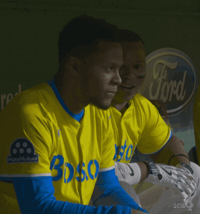 A Man Wearing A Yellow Jersey That Says Boston GIF