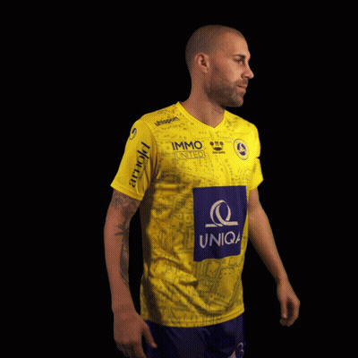 A Man Wearing A Yellow Jersey With The Number 9 Konrad On It GIF
