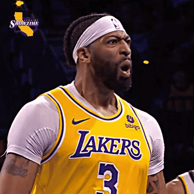 A Man Wearing A Yellow Lakers Jersey With The Number 3 GIF