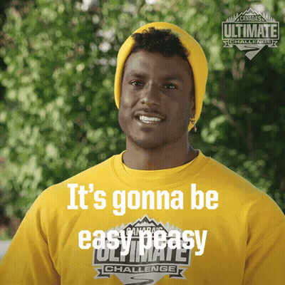 a man wearing a yellow shirt that says " it 's gonna be easy peasy "