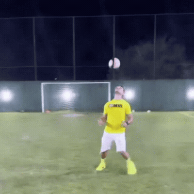 A Man Wearing A Yellow Shirt That Says Mesci GIF