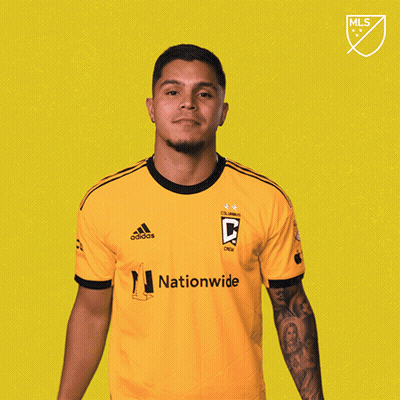 A Man Wearing A Yellow Shirt That Says " Nationwide " On It GIF