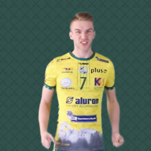 A Man Wearing A Yellow Shirt That Says Plus Saturn On It GIF