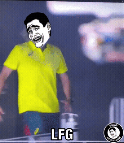 A Man Wearing A Yellow Shirt With A Face On It Is Standing Next To A Bottle That Says Lfg GIF